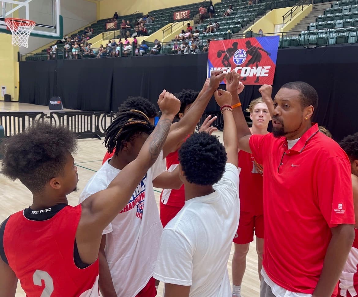 Coach Andre Speech leading a LABCITY team huddle