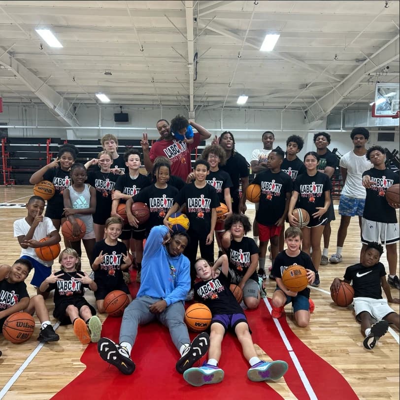 LABCITY players and coaches in LABCITY shirts